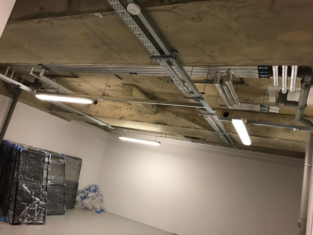 Commercial ceiling conduit and fluorescent lighting installation