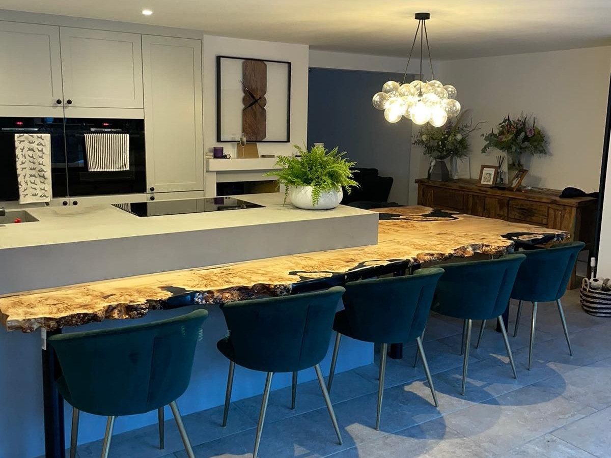 Kitchen dining area with pendant lighting and under-counter LEDs
